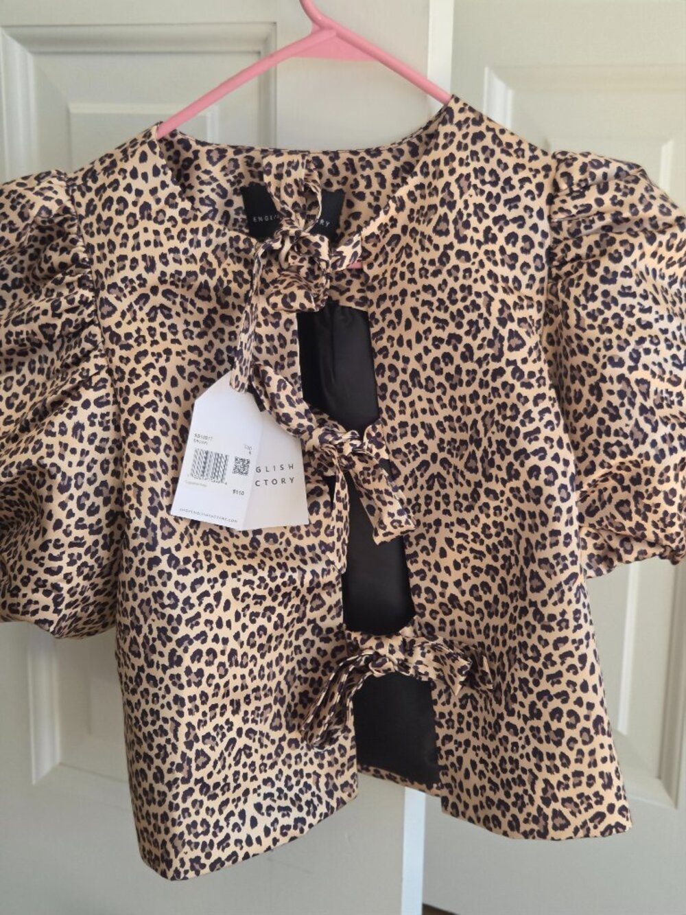 English factory leopard print tie front puff sleeve top. Small. NWT